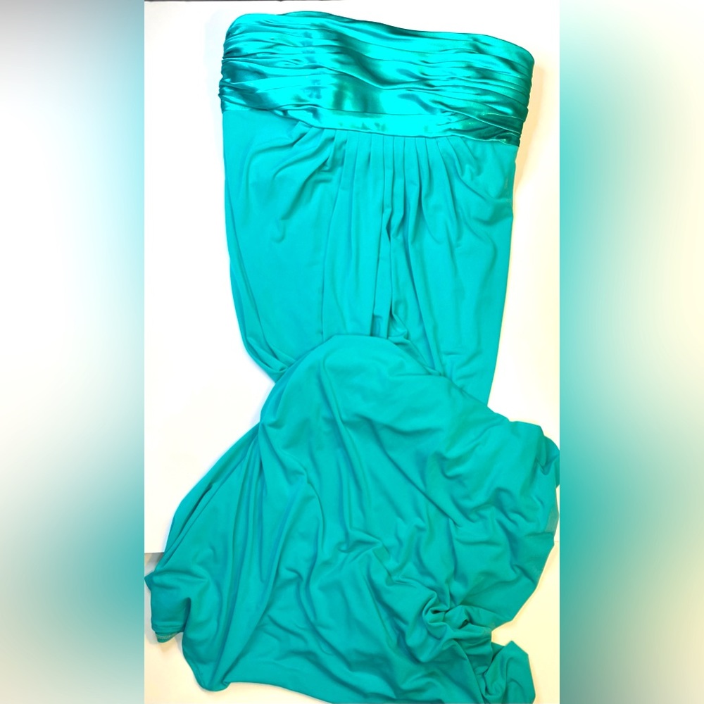 Turquoise semi formal long dress. Sleeveless, satin feel.